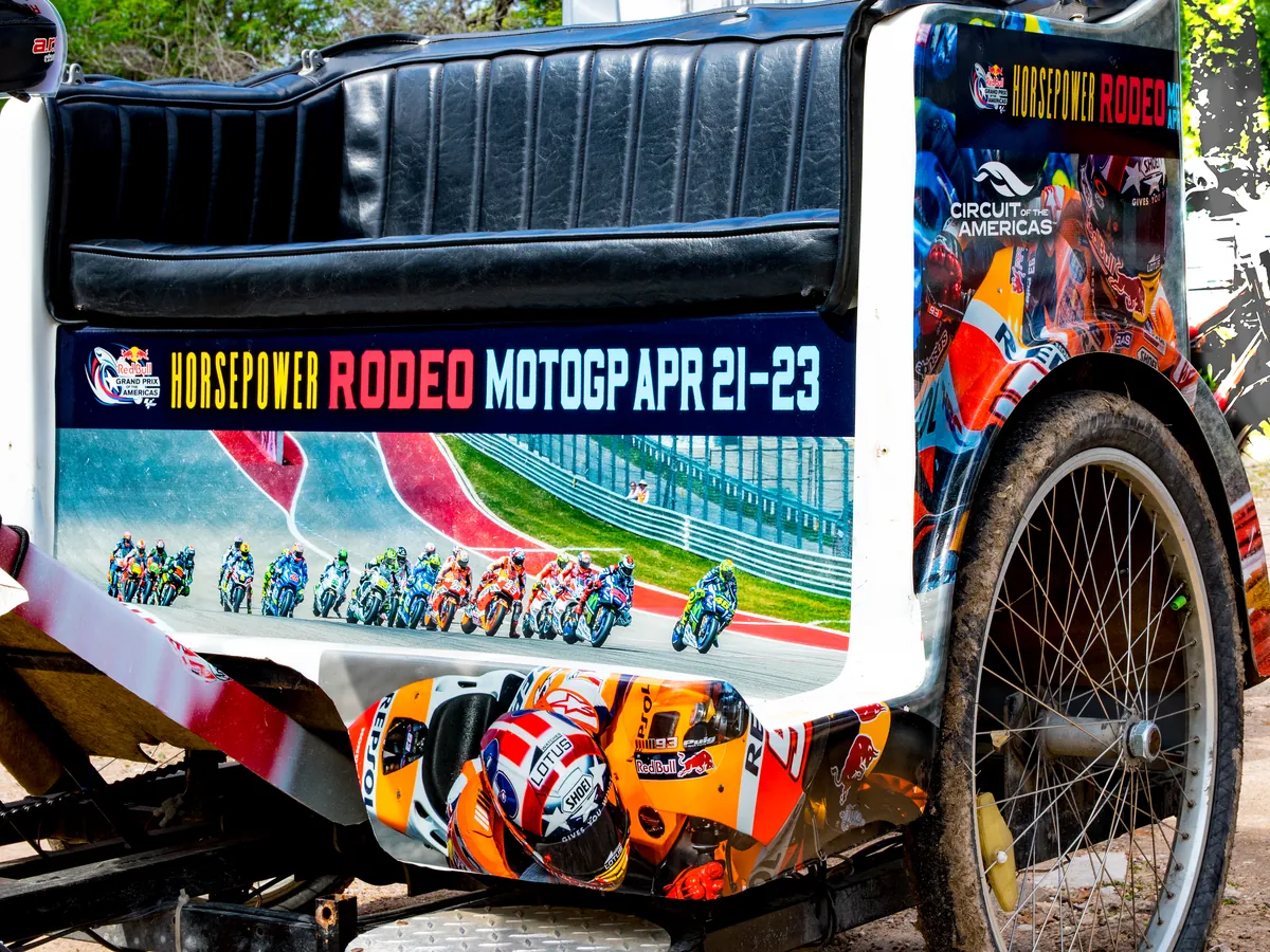 Kween Cab pedicab wrapped as a mobile billboard for MotoGP