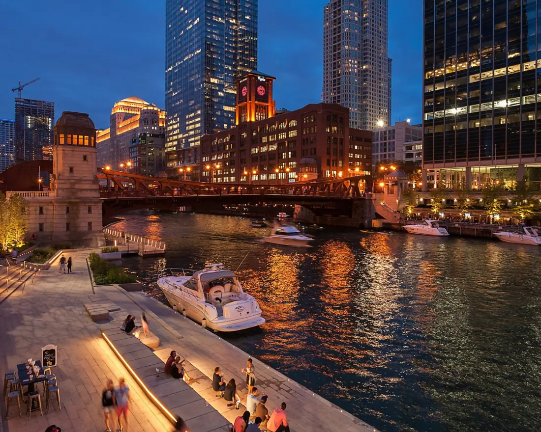 Crowds on the Chicago Riverwalk downtown at night