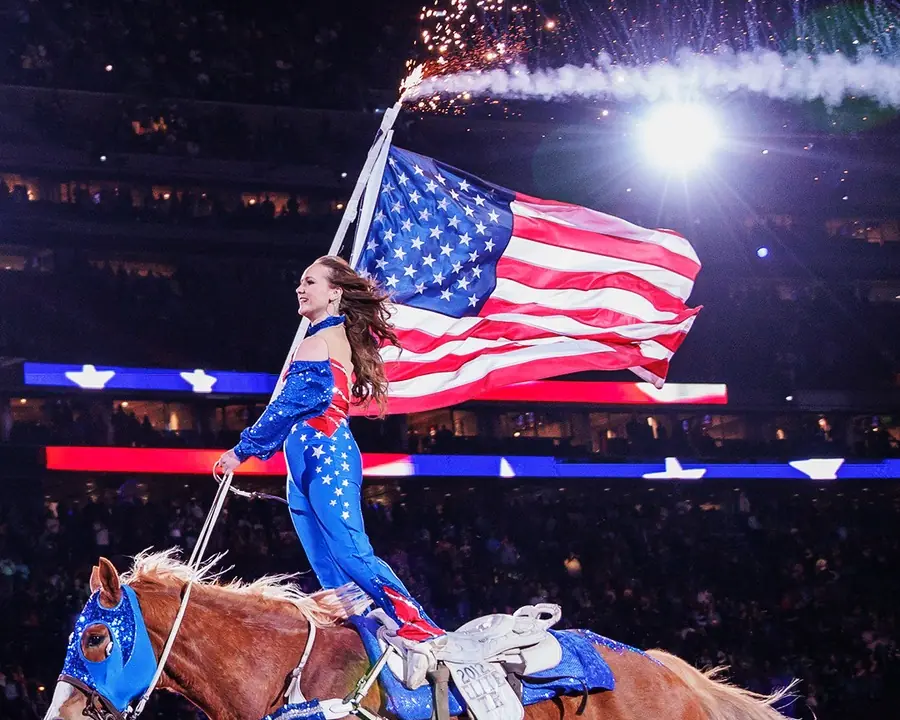 Flag rider during the Houston rodeo grand entry at NRG Stadium