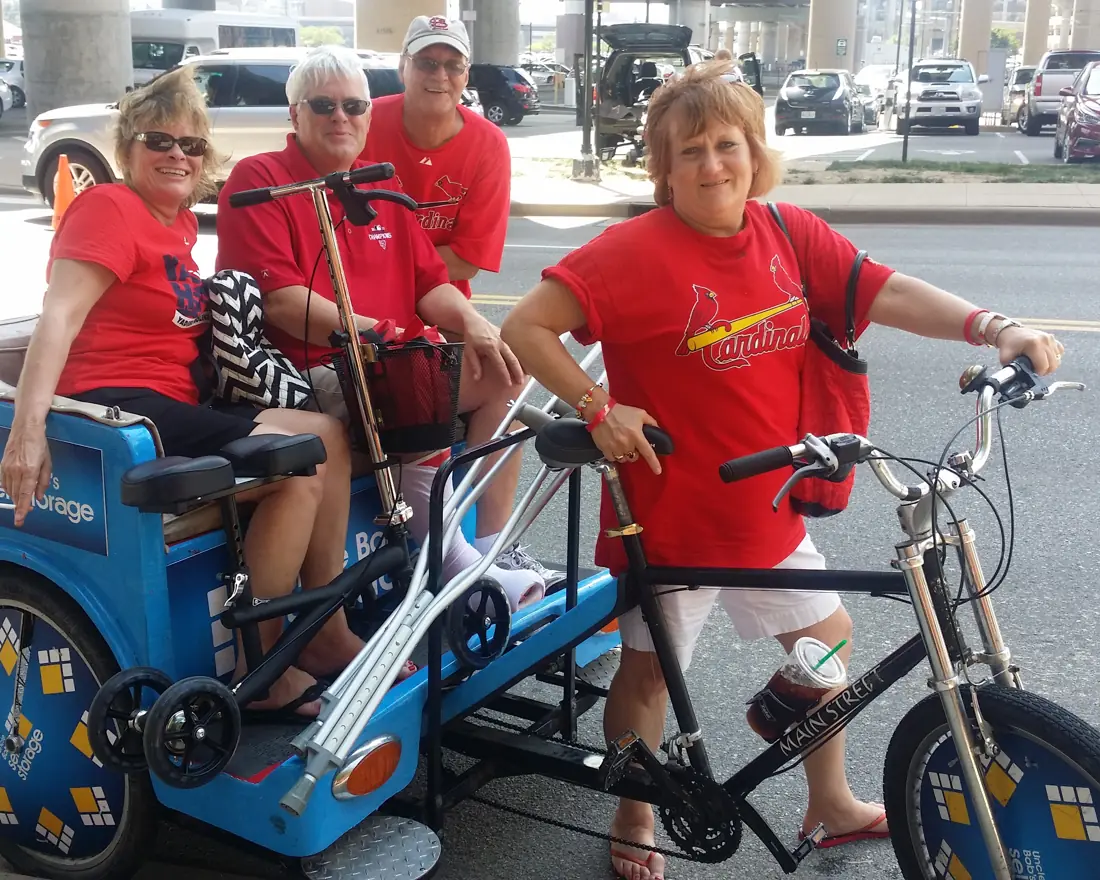 Baseball fans on a sponsored pedicab ride