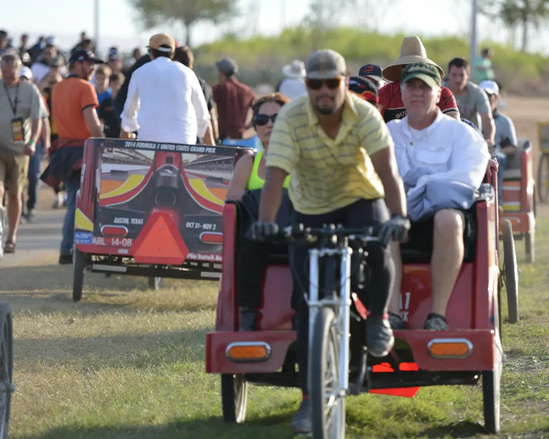 Formula 1 branded pedicab with riders