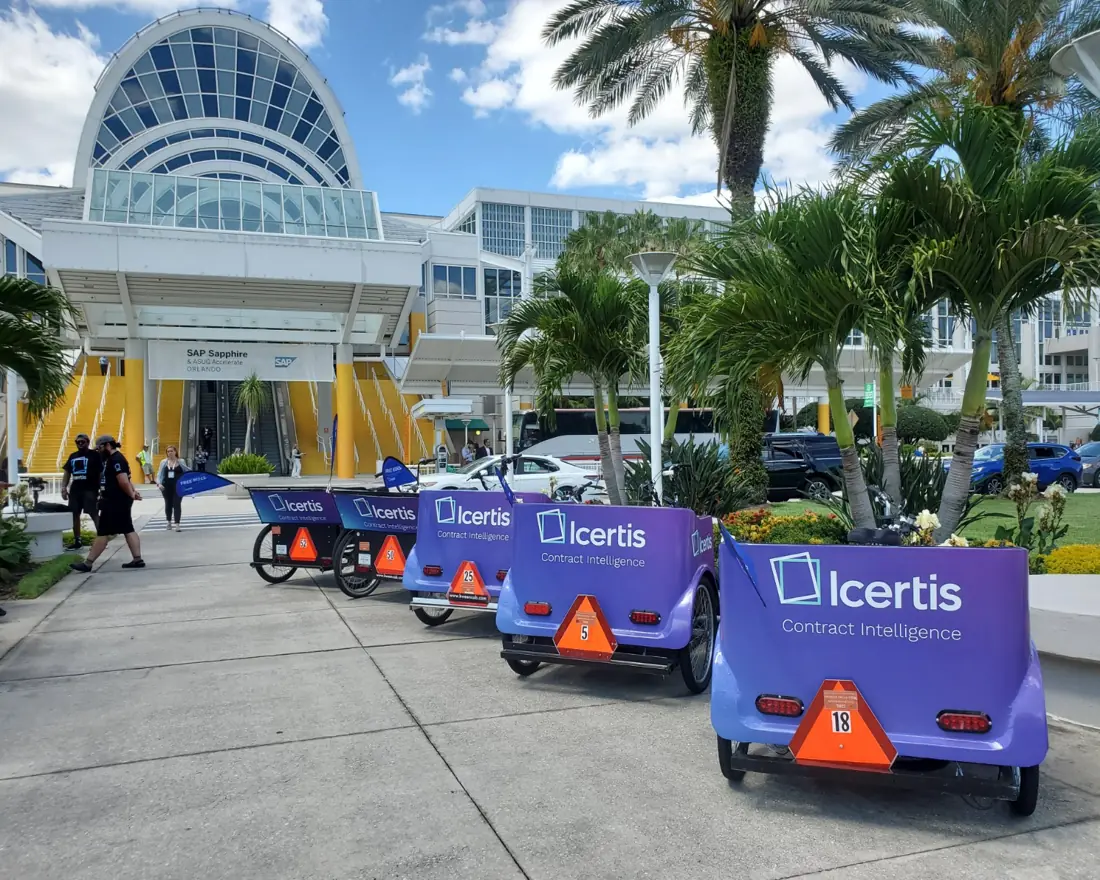 Icertis pedicabs staged at the Orange County Convention Center entrance