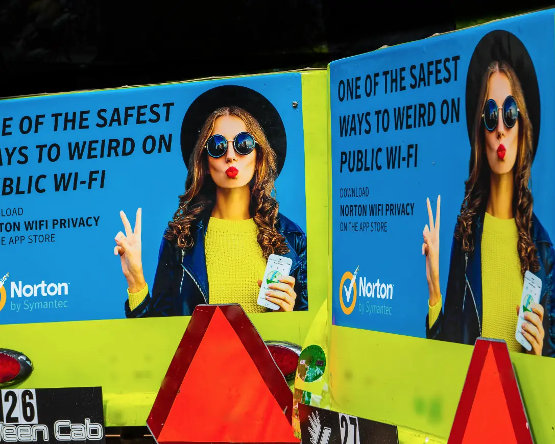 Norton-branded pedicab ad panels