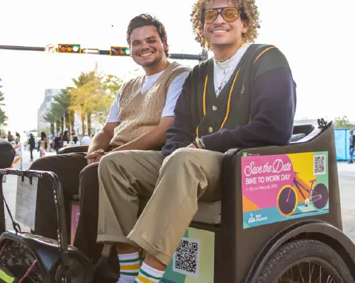 Riders in a branded pedicab