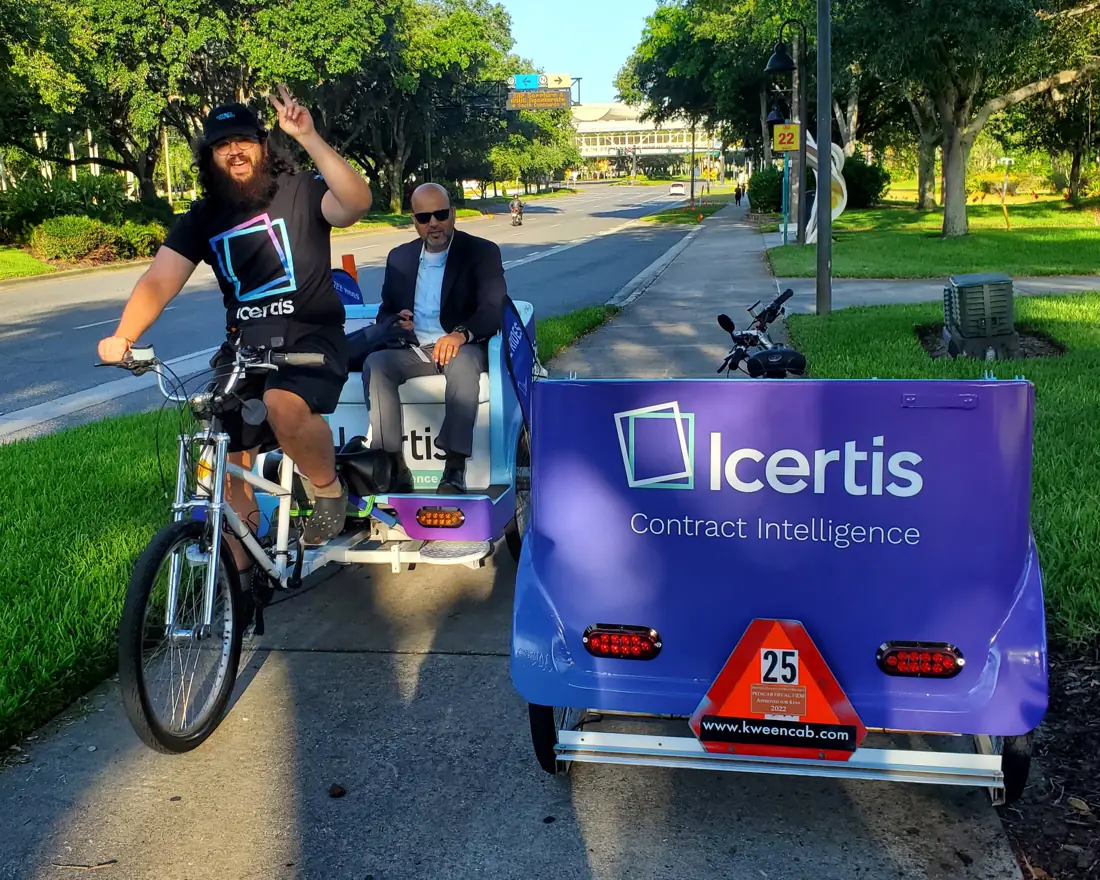 SAP Sapphire attendee riding an Icertis pedicab