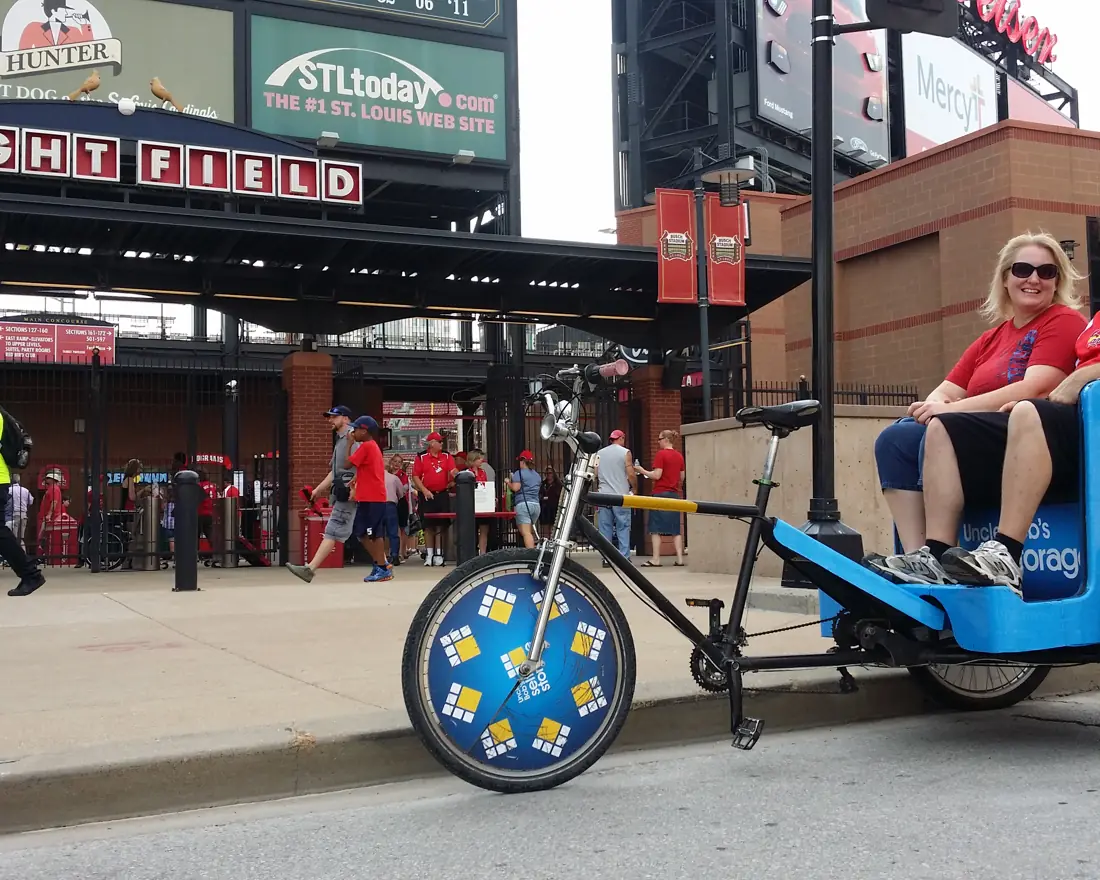 Sponsored pedicab outside a ballpark on game day