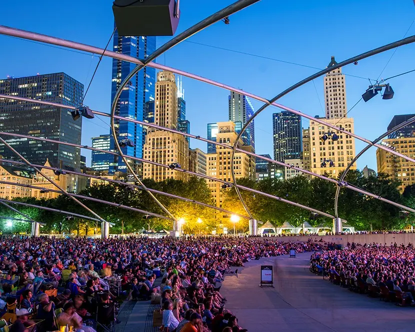 Summer concert crowd at Millennium Park in downtown Chicago