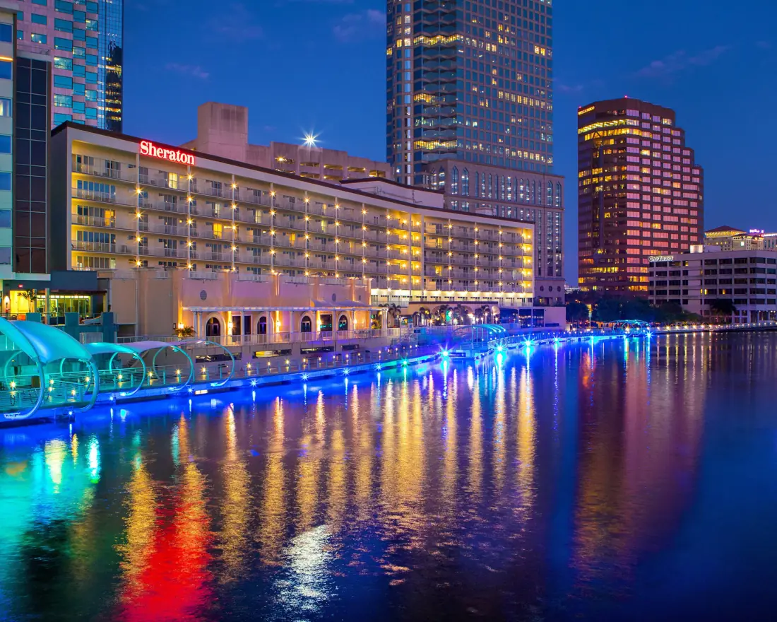 Tampa Riverwalk and downtown waterfront lit up at night